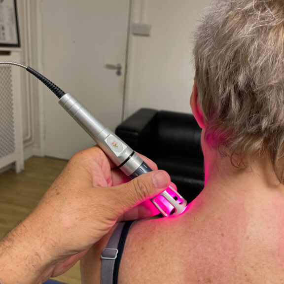 Ben carrying out k-laser treatment